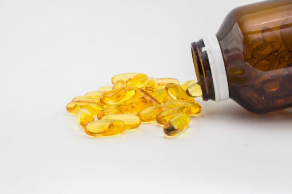 Fish oil capsules and container